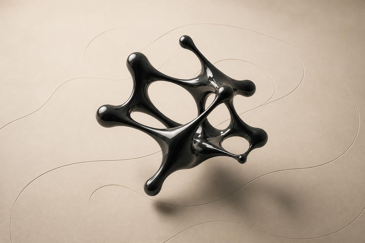 Forme organique noire brillante évoquant un réseau neuronal, posée sur un fond papier crème